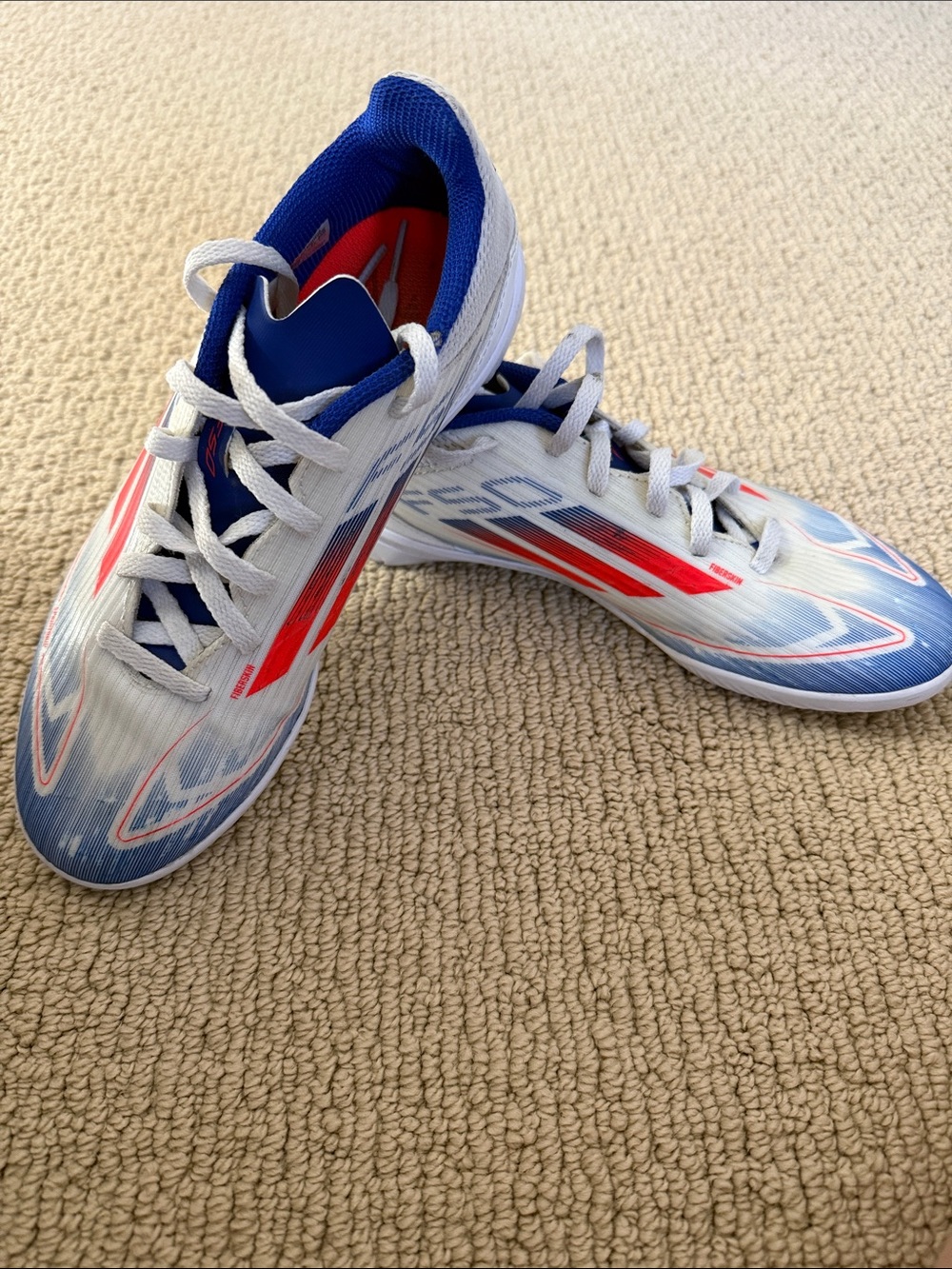 White & Blue indoor Soccer shoes with Red Accents